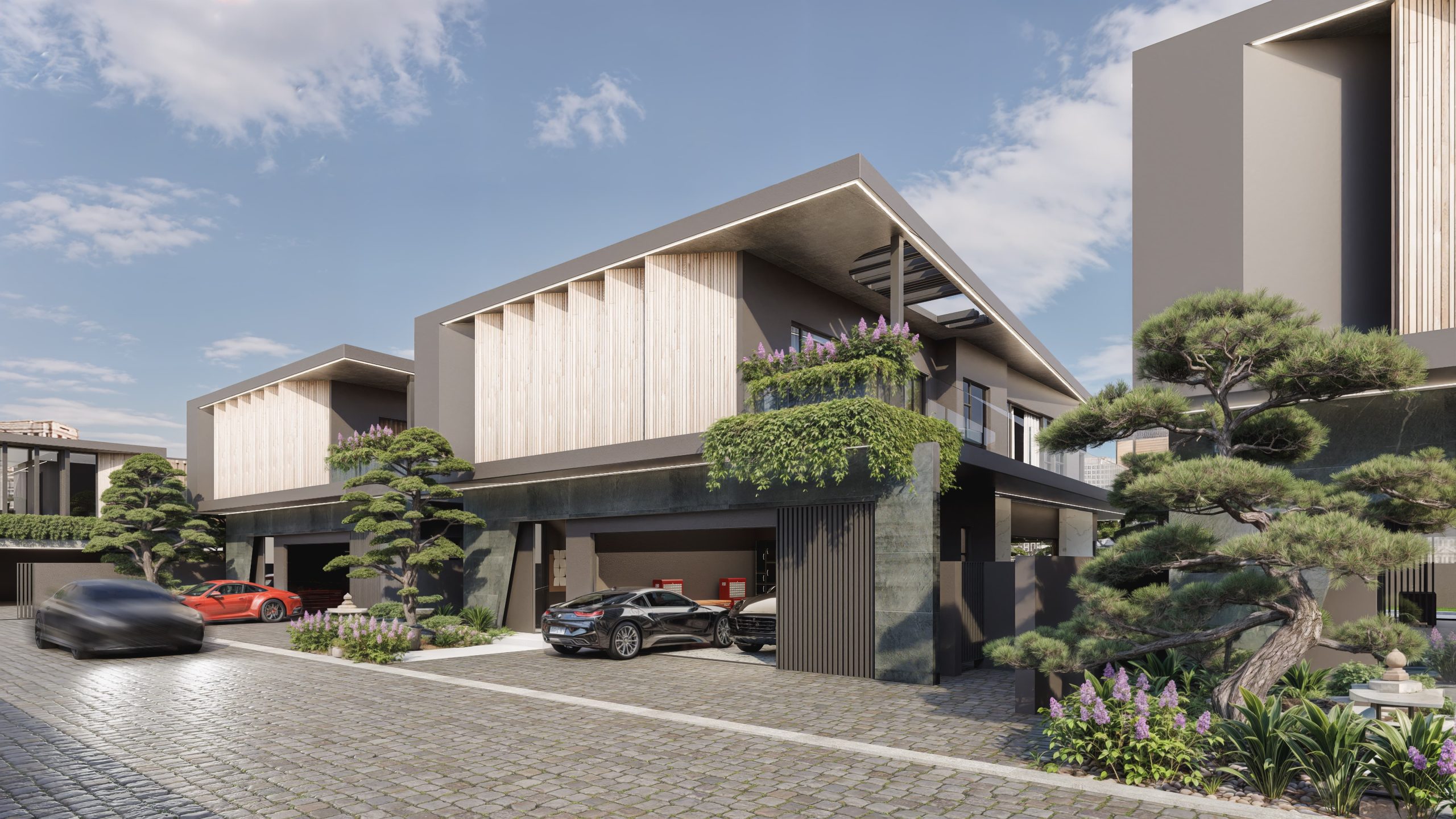 Street-facing render. Cobbled driveway, double garages, dark stone and timber facade, sculptural roof line.