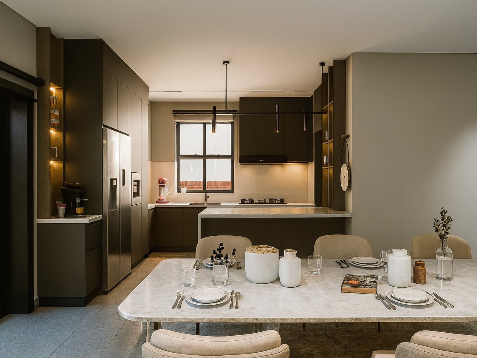 Designer kitchen with island and breakfast seating.